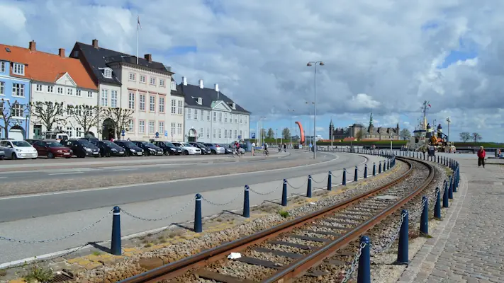 Helsingør harbour with train tracks and Kronborg Castle in the background